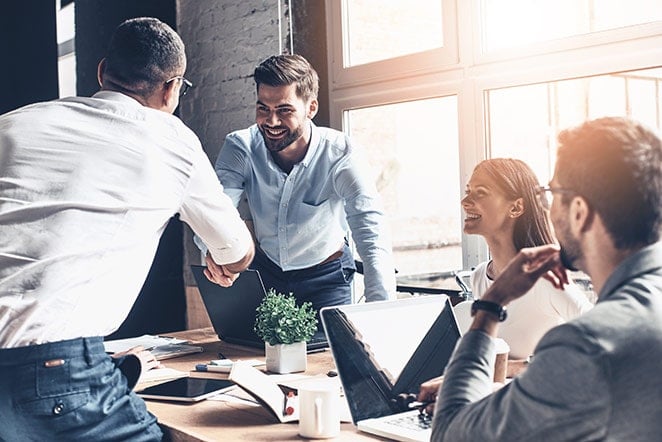 Happy office workers stock photo